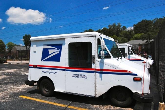 <a href="https://www.theepochtimes.com/assets/uploads/2015/07/USPS+trucks.jpg"><img class="size-medium wp-image-272842" title="USPS+trucks-Postal Service delivery trucks in Williamsburg Village Shopping Center in Atlanta on July 30. (Mary Silver/The Epoch Times)" src="https://www.theepochtimes.com/assets/uploads/2015/07/USPS+trucks-676x450.jpg" alt="Postal Service delivery trucks in Williamsburg Village Shopping Center in Atlanta on July 30. (Mary Silver/The Epoch Times)" width="350" height="232"/></a>