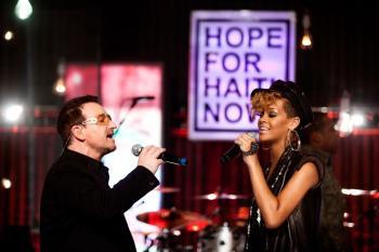 <a href="https://www.theepochtimes.com/assets/uploads/2015/07/bono95980449_medium.jpg"><img src="https://www.theepochtimes.com/assets/uploads/2015/07/bono95980449_medium.jpg" alt="Bono and Rihanna perform from London during the 'Hope For Haiti Now' telecast. (MJ Kim/MTV Hope for Haiti Now via Getty Images)" title="Bono and Rihanna perform from London during the 'Hope For Haiti Now' telecast. (MJ Kim/MTV Hope for Haiti Now via Getty Images)" width="320" class="size-medium wp-image-98684"/></a>