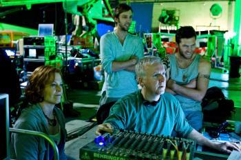 <a href="https://www.theepochtimes.com/assets/uploads/2015/07/cameron_medium.jpg"><img src="https://www.theepochtimes.com/assets/uploads/2015/07/cameron_medium.jpg" alt="On the set of 'Avatar', writer-director James Cameron (front, center) reviews a scene with actors (from left) Sigourney Weaver, Joel David Moore, and Sam Worthington. (Mark Fellman/ Twentieth Century Fox)" title="On the set of 'Avatar', writer-director James Cameron (front, center) reviews a scene with actors (from left) Sigourney Weaver, Joel David Moore, and Sam Worthington. (Mark Fellman/ Twentieth Century Fox)" width="320" class="size-medium wp-image-96777"/></a>