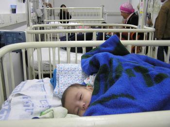 <a href="https://www.theepochtimes.com/assets/uploads/2015/07/mamhoudbaby_medium.jpg"><img src="https://www.theepochtimes.com/assets/uploads/2015/07/mamhoudbaby_medium.jpg" alt="Baby Mahmud, from Gaza, receives treatment in Barzilai hospital. (The Epoch Times)" title="Baby Mahmud, from Gaza, receives treatment in Barzilai hospital. (The Epoch Times)" width="300" class="size-medium wp-image-64429"/></a>