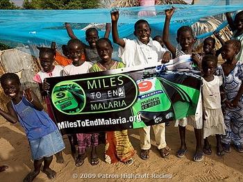 <a href="https://www.theepochtimes.com/assets/uploads/2015/07/mileschildren_medium.jpg"><img src="https://www.theepochtimes.com/assets/uploads/2015/07/mileschildren_medium.jpg" alt="Children in Africa display a mosquito net and a 'Miles to End Malaria' banner. (Patr&#243n Highcroft Racing)" title="Children in Africa display a mosquito net and a 'Miles to End Malaria' banner. (Patr&#243n Highcroft Racing)" width="320" class="size-medium wp-image-89679"/></a>