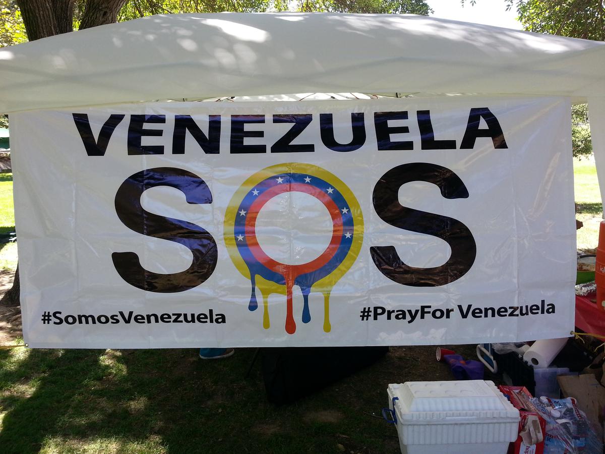 A common sight these days, the SOS Venezuela banner echoes the feelings of the opposition to the Venezuelan government. (Timothy Wahl)