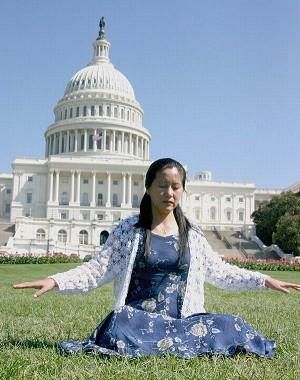 Ms. Li Weixun doing Falun Gong exercises in front of Capital Hill. Photo: The Epoch Times