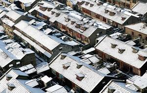 Urban residential houses covered with snow (Getty Images)