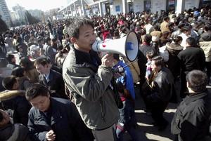 Beijing: trying to maintain order outside an employment exposition (AFP/Getty Images)