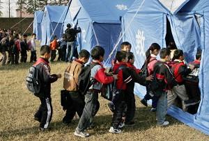 Temporary schools are set up in tents after an earthquake hits Jiangxi Province. (AFP/Getty Images)