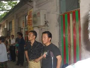 Qi Zhiyong and Jiao Guobiao from Ark Church. (The Epoch Times)
