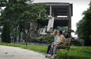 Mr and Mrs Guo are old residents of Tangshan city and survivors of the earthquake. They reminisce the past at the site of the earthquake. (China Photos/Getty Images)