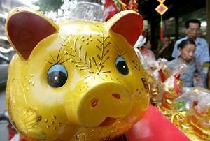 Bangkok, Thailand-A mascot of a pig prior to Lunar New Year celebrations (Pornchai Kittiwongsakul/ AFP)