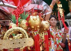 Bangkok, Thailand-Decorations symbolize the Year of Pig. (Pornchai Kittiwongsakul/AFP)