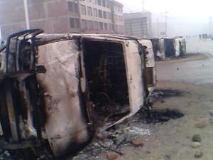 Burned police vehicles after the riot. (Pan-Blue Coalition