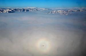 February 8, 2007, the wonder of Buddha's Light was captured above the Baihaba scenic spot in the Kanas scenic area in Xinjiang Province. (The Epoch Times)