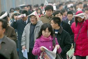 A job fair in Beijing's Agriculture Exhibition Center on March 1, 2007 saw tens of thousands of job seekers. (The Epoch Times)