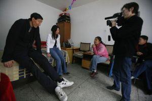 Bao Xishu and his new wife, Xia Shujuan, were interviewed at their home on March 30. 2007. (China Photos/Getty Images)