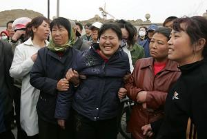 Family members of the victims. (Epoch Times Archive)