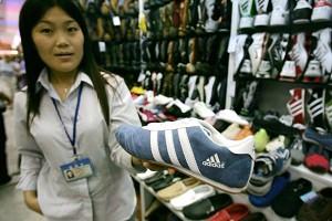Counterfeit name-brand athletic shoes sold in a Beijing shoe store. (Peter Parks/AFP/Getty Images)