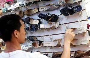 Counterfeit name-brand shoes sold on Shanghai streets. (AFP/Getty Images)