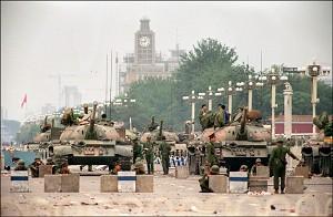 People's Liberation Army (PLA) tanks guard a strategic Chang'an Avenue leading to Tiananmen Square June 6, 1989. (Manuel Ceneta/AFP/Getty Images)