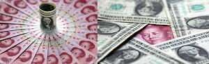 The RMB exchange rate is increasing at a constant pace. The experts have warned that excessive appreciation of RMB could lead to a financial crisis. (China Photos/Getty Images)