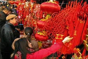 February 5, 2008, Beijing, residents are shopping for decorations. (Teh Eng Koon/AFP/Getty Images)