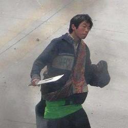A Chinese Thai witnessed a Chinese policeman disguised as Tibetan holding a knife. (Courtesy of Sound of Hope Radio)