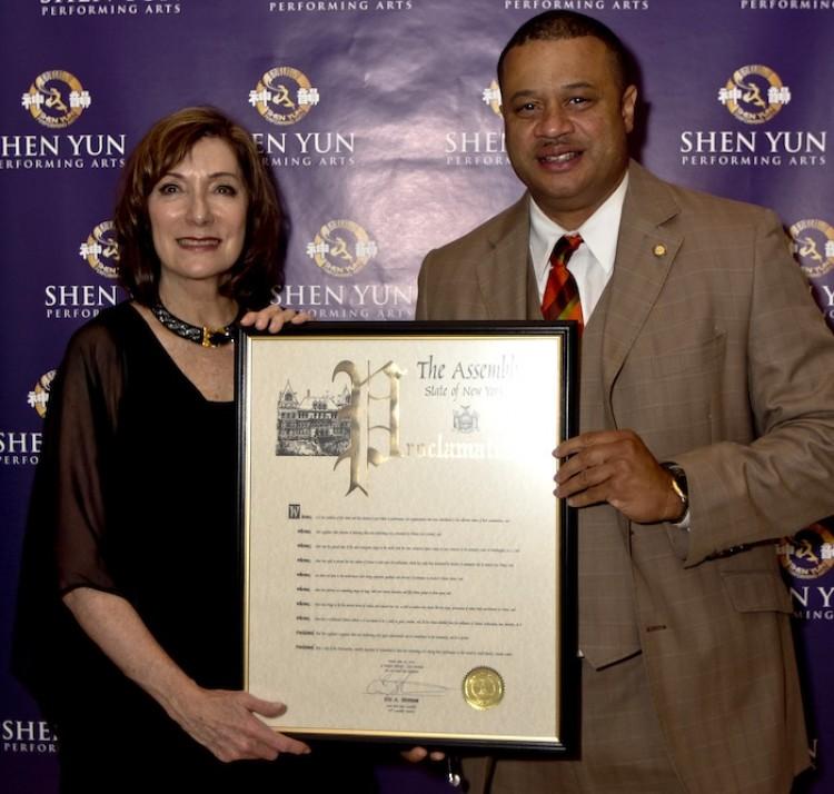 <a><img src="https://www.theepochtimes.com/assets/uploads/2015/09/045_Gail_Rachlin,_Eric_Stevenson.jpg" alt="New York Assemblyman Eric Stevenson with Gail Rachlin from Chinese Arts Revival, the presenter of Shen Yun Performing Arts, holding the New York State Assembly proclamation at Lincoln Center's David H. Koch Theater on June 24. (The Epoch Times)" title="New York Assemblyman Eric Stevenson with Gail Rachlin from Chinese Arts Revival, the presenter of Shen Yun Performing Arts, holding the New York State Assembly proclamation at Lincoln Center's David H. Koch Theater on June 24. (The Epoch Times)" width="320" class="size-medium wp-image-1802026"/></a>