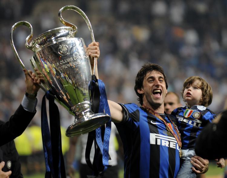 <a><img src="https://www.theepochtimes.com/assets/uploads/2015/09/100348768.jpg" alt="SPAIN: Inter Milan's Argentinian forward Diego Milito celebrates with the trophy after winning the UEFA Champions League final football match Inter Milan against Bayern Munich at the Santiago Bernabeu stadium in Madrid (PIERRE-PHILIPPE MARCOU/AFP/Getty Images)" title="SPAIN: Inter Milan's Argentinian forward Diego Milito celebrates with the trophy after winning the UEFA Champions League final football match Inter Milan against Bayern Munich at the Santiago Bernabeu stadium in Madrid (PIERRE-PHILIPPE MARCOU/AFP/Getty Images)" width="320" class="size-medium wp-image-1819572"/></a>