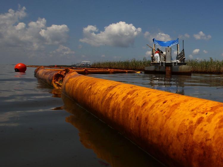 <a><img src="https://www.theepochtimes.com/assets/uploads/2015/09/101327195.jpg" alt="An oil containment boom floats in the water as contract workers from BP use skimmers to clean oil from a marsh near Pass a Loutre in Louisiana. (Win McNamee/Getty Images)" title="An oil containment boom floats in the water as contract workers from BP use skimmers to clean oil from a marsh near Pass a Loutre in Louisiana. (Win McNamee/Getty Images)" width="320" class="size-medium wp-image-1819073"/></a>
