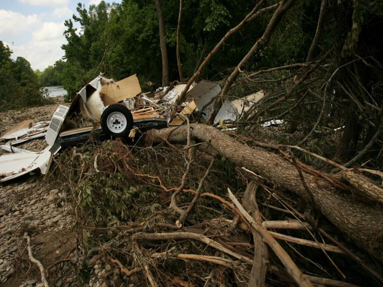 <a><img src="https://www.theepochtimes.com/assets/uploads/2015/09/102083147-flash_flood.jpg" alt="A destroyed camper rests on a pile of downed trees in the aftermath of a flash flood on Caddo River June 13 in Caddo Gap, Arkansas. National Flood Specialist with the USGS, Dr. Robert Holmes said campers need to be cautious when choosing campsites and sho (David Yerby/Getty Images)" title="A destroyed camper rests on a pile of downed trees in the aftermath of a flash flood on Caddo River June 13 in Caddo Gap, Arkansas. National Flood Specialist with the USGS, Dr. Robert Holmes said campers need to be cautious when choosing campsites and sho (David Yerby/Getty Images)" width="320" class="size-medium wp-image-1818563"/></a>