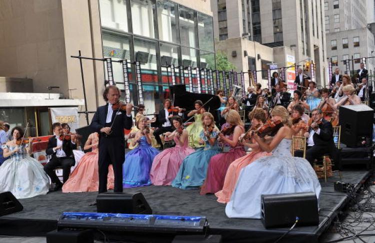<a><img src="https://www.theepochtimes.com/assets/uploads/2015/09/102139546.jpg" alt="Dutch violinist Andre Rieu and his Johann Strauss Orchestra perform on NBC's 'Today' at Rockefeller Center on June 16 in New York City. (Slaven Vlasic/Getty Images)" title="Dutch violinist Andre Rieu and his Johann Strauss Orchestra perform on NBC's 'Today' at Rockefeller Center on June 16 in New York City. (Slaven Vlasic/Getty Images)" width="320" class="size-medium wp-image-1814433"/></a>