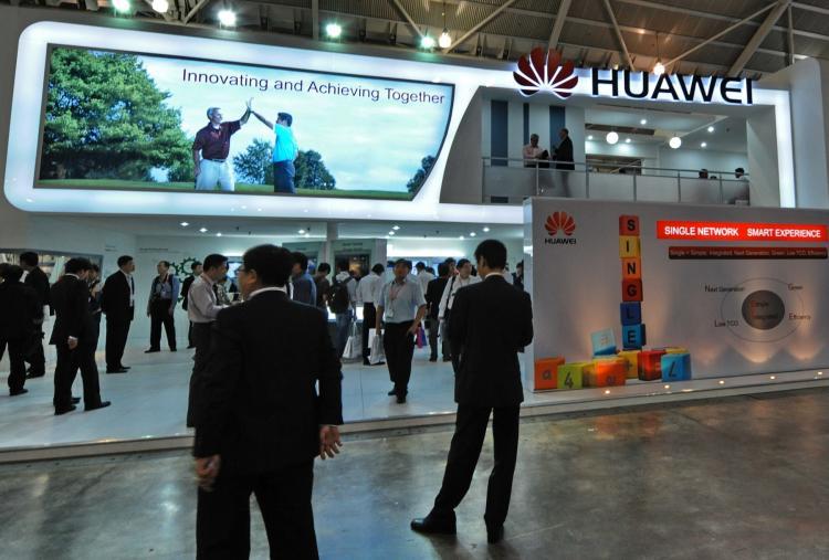 <a><img src="https://www.theepochtimes.com/assets/uploads/2015/09/102236006.jpg" alt="Huawei Technologies booth display of its product during CommunicAsia 2010 conference and exhibtion show in Singapore.   (Roslan Rahman/Getty Images)" title="Huawei Technologies booth display of its product during CommunicAsia 2010 conference and exhibtion show in Singapore.   (Roslan Rahman/Getty Images)" width="320" class="size-medium wp-image-1807501"/></a>