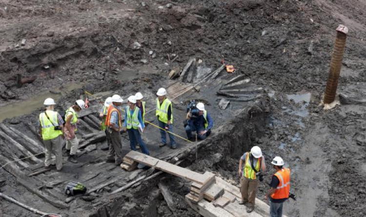 <a><img src="https://www.theepochtimes.com/assets/uploads/2015/09/102916684.jpg" alt="Workers and members of the media inspect the hull of a late 18th/early 19th century ship found at Ground Zero (WTC) July 15, in New York. (Don Emmert/Getty Images)" title="Workers and members of the media inspect the hull of a late 18th/early 19th century ship found at Ground Zero (WTC) July 15, in New York. (Don Emmert/Getty Images)" width="320" class="size-medium wp-image-1817334"/></a>
