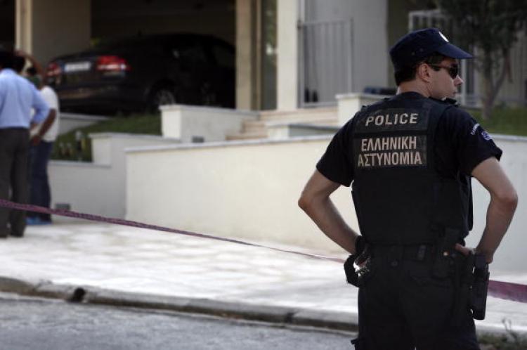 <a><img src="https://www.theepochtimes.com/assets/uploads/2015/09/102965995.jpg" alt="CRIME SCENE: A police officer stands in front of the house of Greek journalist Socratis Guiolas after his assassination on July 19 in a suburb of Athens, Greece.  (Angelos Tzortzinis/Getty Images)" title="CRIME SCENE: A police officer stands in front of the house of Greek journalist Socratis Guiolas after his assassination on July 19 in a suburb of Athens, Greece.  (Angelos Tzortzinis/Getty Images)" width="320" class="size-medium wp-image-1817187"/></a>