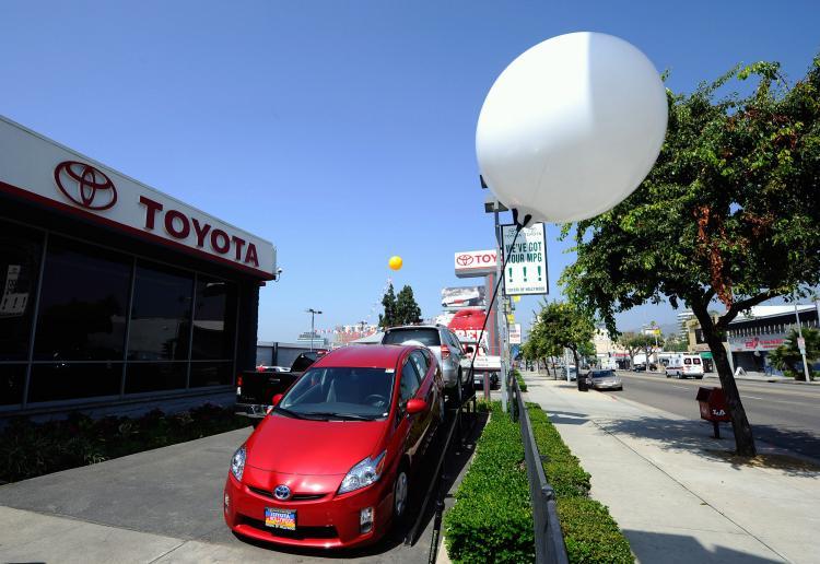 <a><img src="https://www.theepochtimes.com/assets/uploads/2015/09/103233868.jpg" alt="Toyota Prius hybrid cars are displayed at the Toyota of Hollywood dealership on August 4, 2010 in Hollywood, California.(Kevork Djansezian/Getty Images)" title="Toyota Prius hybrid cars are displayed at the Toyota of Hollywood dealership on August 4, 2010 in Hollywood, California.(Kevork Djansezian/Getty Images)" width="320" class="size-medium wp-image-1816598"/></a>