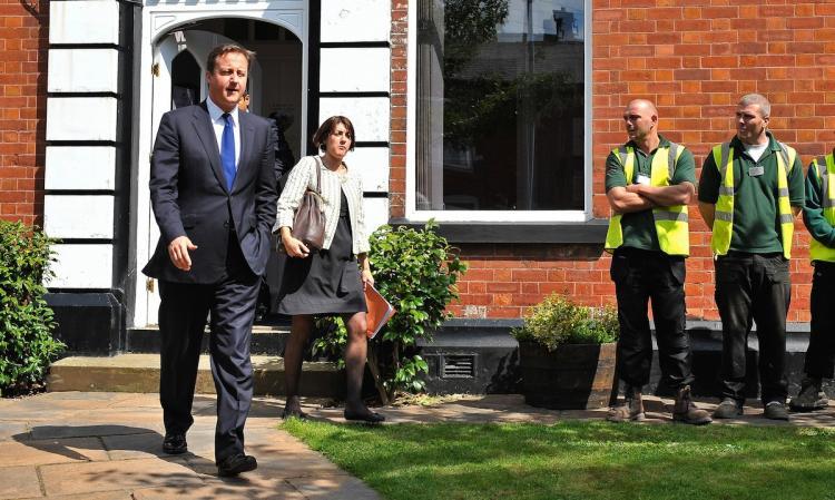 <a><img src="https://www.theepochtimes.com/assets/uploads/2015/09/103326969.jpg" alt="Prime Minister David Cameron visits community-based charity St Peter's Partnerships on August 10, in Ashton under Lyne, England. The prime minister unveiled a crackdown on benefit cheats using private credit reference agencies to detect fraudulent claims. (Bruce Adams - WPA/Getty Iamges)" title="Prime Minister David Cameron visits community-based charity St Peter's Partnerships on August 10, in Ashton under Lyne, England. The prime minister unveiled a crackdown on benefit cheats using private credit reference agencies to detect fraudulent claims. (Bruce Adams - WPA/Getty Iamges)" width="320" class="size-medium wp-image-1816319"/></a>