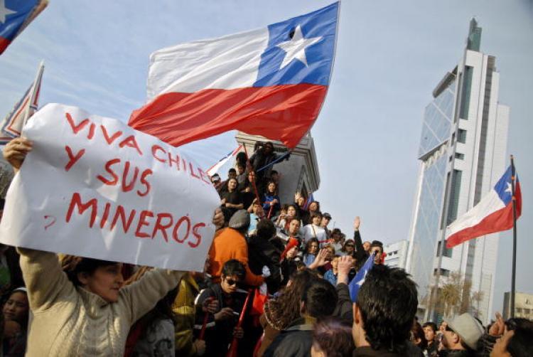<a><img src="https://www.theepochtimes.com/assets/uploads/2015/09/103539894.jpg" alt="A woman holds a sign reading 'Long live Chile and its miners' as Chileans celebrate in the streets of Santiago after the confirmation of the survival of the 33 trapped miners on August 22.  (Ariel Marinkovic/Getty IMages )" title="A woman holds a sign reading 'Long live Chile and its miners' as Chileans celebrate in the streets of Santiago after the confirmation of the survival of the 33 trapped miners on August 22.  (Ariel Marinkovic/Getty IMages )" width="320" class="size-medium wp-image-1815811"/></a>