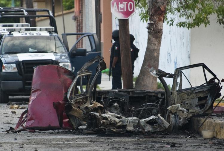 <a><img src="https://www.theepochtimes.com/assets/uploads/2015/09/103659330.jpg" alt="A burned car pictured in front of Televisa's local office in Ciudad Victoria after a car bomb exploded early Friday. (Ronaldo Schemidt/AFP/Getty Images)" title="A burned car pictured in front of Televisa's local office in Ciudad Victoria after a car bomb exploded early Friday. (Ronaldo Schemidt/AFP/Getty Images)" width="320" class="size-medium wp-image-1815431"/></a>