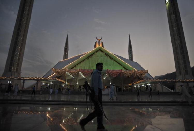 <a><img src="https://www.theepochtimes.com/assets/uploads/2015/09/103865941.jpg" alt="A Pakistani policeman patrols at the Faisal Mosque in Islamabad on September 6. Islamabad Police announced that it will formally charge three men connected to Faisal Shahzad, the would-be Times Square car bomber. (Farooq Naeem/Getty Images)" title="A Pakistani policeman patrols at the Faisal Mosque in Islamabad on September 6. Islamabad Police announced that it will formally charge three men connected to Faisal Shahzad, the would-be Times Square car bomber. (Farooq Naeem/Getty Images)" width="320" class="size-medium wp-image-1814996"/></a>