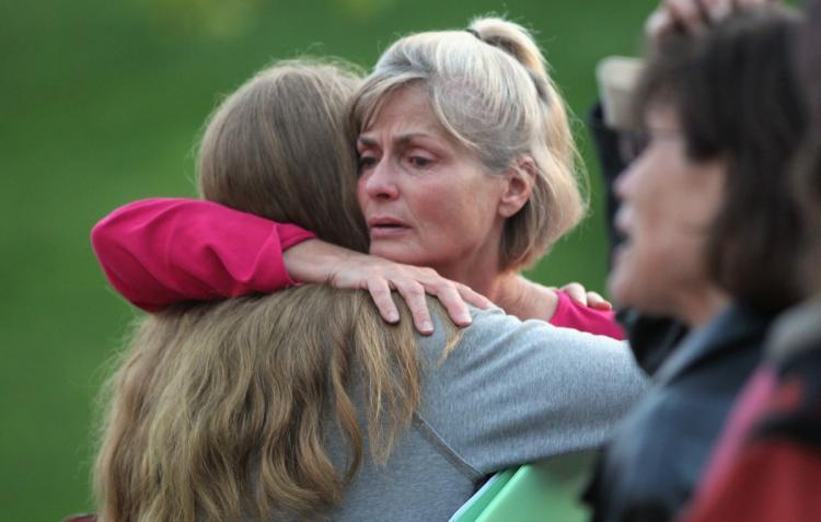 <a><img src="https://www.theepochtimes.com/assets/uploads/2015/09/103930234.jpg" alt="Residents evacuated due to wildfire embrace before a community meeting September 8, in Boulder, Colorado. More than 140 structures, many of them houses, were destroyed, along with 6,000 acres burnt in the Fourmile Canyon fire to the west of Boulder. (John Moore/Getty Images)" title="Residents evacuated due to wildfire embrace before a community meeting September 8, in Boulder, Colorado. More than 140 structures, many of them houses, were destroyed, along with 6,000 acres burnt in the Fourmile Canyon fire to the west of Boulder. (John Moore/Getty Images)" width="320" class="size-medium wp-image-1814963"/></a>
