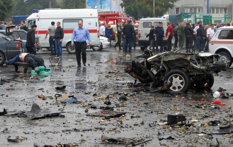 <a><img src="https://www.theepochtimes.com/assets/uploads/2015/09/103933047.jpg" alt="Russian investigators examine the site of a blast near a market in Vladikavkaz on September 9, 2010. (STR/AFP/Getty Images)" title="Russian investigators examine the site of a blast near a market in Vladikavkaz on September 9, 2010. (STR/AFP/Getty Images)" width="320" class="size-medium wp-image-1814942"/></a>