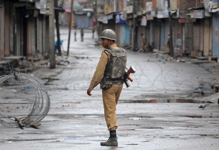 <a><img src="https://www.theepochtimes.com/assets/uploads/2015/09/104074356.jpg" alt="An Indian paramilitary soldier patrols the curfew bound streets of Srinigar on September 14. Thousands of Indian troops enforced a curfew across Kashmir after 17 people were killed during the bloodiest day of a summer of unrest in the disputed region. (Tauseef Mustafa/Getty Images)" title="An Indian paramilitary soldier patrols the curfew bound streets of Srinigar on September 14. Thousands of Indian troops enforced a curfew across Kashmir after 17 people were killed during the bloodiest day of a summer of unrest in the disputed region. (Tauseef Mustafa/Getty Images)" width="320" class="size-medium wp-image-1814744"/></a>