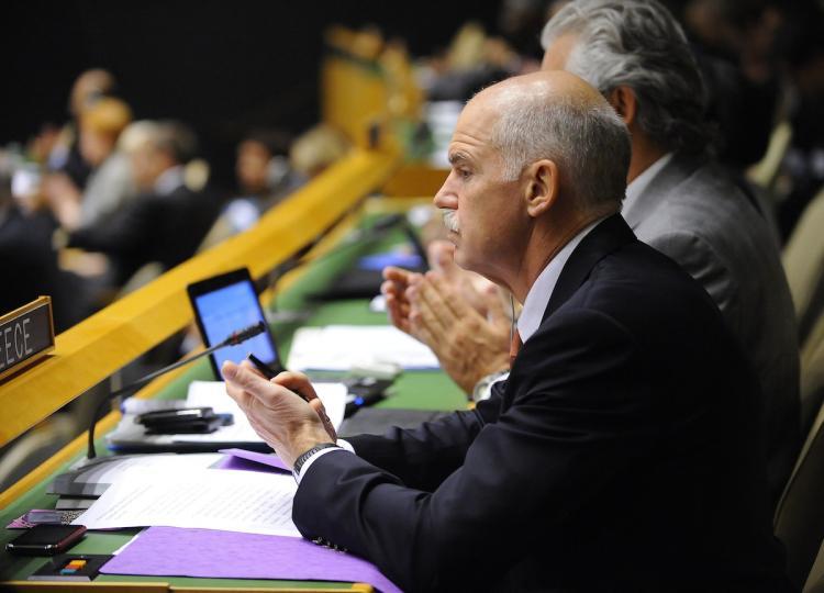 <a><img src="https://www.theepochtimes.com/assets/uploads/2015/09/104292527.jpg" alt="Greek Prime Minister George Papandreou attends the Millennium Development Goals Summit at the United Nations headquarters in New York, September 20. Nearly 140 world leaders will attend the three-day summit on ending global poverty, hunger and disease within the next five years.(Emmanuel Dunand/Getty Images )" title="Greek Prime Minister George Papandreou attends the Millennium Development Goals Summit at the United Nations headquarters in New York, September 20. Nearly 140 world leaders will attend the three-day summit on ending global poverty, hunger and disease within the next five years.(Emmanuel Dunand/Getty Images )" width="320" class="size-medium wp-image-1814490"/></a>