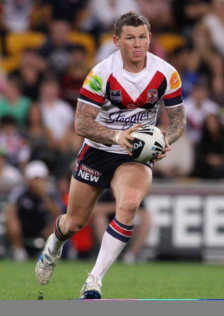 <a><img src="https://www.theepochtimes.com/assets/uploads/2015/09/104398039.jpg" alt="Todd Carney of the Roosters runs with the ball during the First NRL Preliminary Final match between the Gold Coast Titans and the Sydney Roosters at Suncorp Stadium on Sept. 24 in Brisbane. (Bradley Kanaris/Getty Images)" title="Todd Carney of the Roosters runs with the ball during the First NRL Preliminary Final match between the Gold Coast Titans and the Sydney Roosters at Suncorp Stadium on Sept. 24 in Brisbane. (Bradley Kanaris/Getty Images)" width="320" class="size-medium wp-image-1814120"/></a>