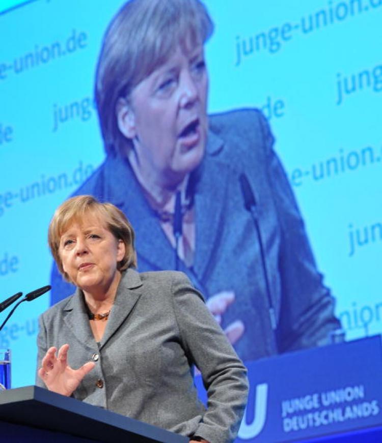 <a><img src="https://www.theepochtimes.com/assets/uploads/2015/09/105557394.jpg" alt="German Chancellor Angela Merkel addresses a meeting of the Junge Union, the youth group of her Christian Democrats party (CDU) in the eastern German city of Potsdam on Oct. 16, 2010.  (Bernd Settnik/AFP/Getty Images)" title="German Chancellor Angela Merkel addresses a meeting of the Junge Union, the youth group of her Christian Democrats party (CDU) in the eastern German city of Potsdam on Oct. 16, 2010.  (Bernd Settnik/AFP/Getty Images)" width="320" class="size-medium wp-image-1813366"/></a>