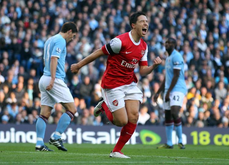 <a><img src="https://www.theepochtimes.com/assets/uploads/2015/09/105992180.jpg" alt="Arsenals Samir Nasri got the Gunners rolling at the Eastlands on Sunday. (Clive Rose/Getty Images)" title="Arsenals Samir Nasri got the Gunners rolling at the Eastlands on Sunday. (Clive Rose/Getty Images)" width="320" class="size-medium wp-image-1813140"/></a>