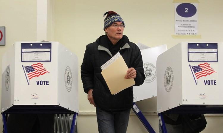 <a><img src="https://www.theepochtimes.com/assets/uploads/2015/09/106449780.jpg" alt="A voter walks away from a booth after marking his ballot at a Manhattan polling place November 2, 2010 in New York City. President Barack Obama's Democrats are facing challenges from Republicans nationwide as they attempt to seize control of Capitol Hill. (Mario Tama/Getty Images)" title="A voter walks away from a booth after marking his ballot at a Manhattan polling place November 2, 2010 in New York City. President Barack Obama's Democrats are facing challenges from Republicans nationwide as they attempt to seize control of Capitol Hill. (Mario Tama/Getty Images)" width="320" class="size-medium wp-image-1802701"/></a>