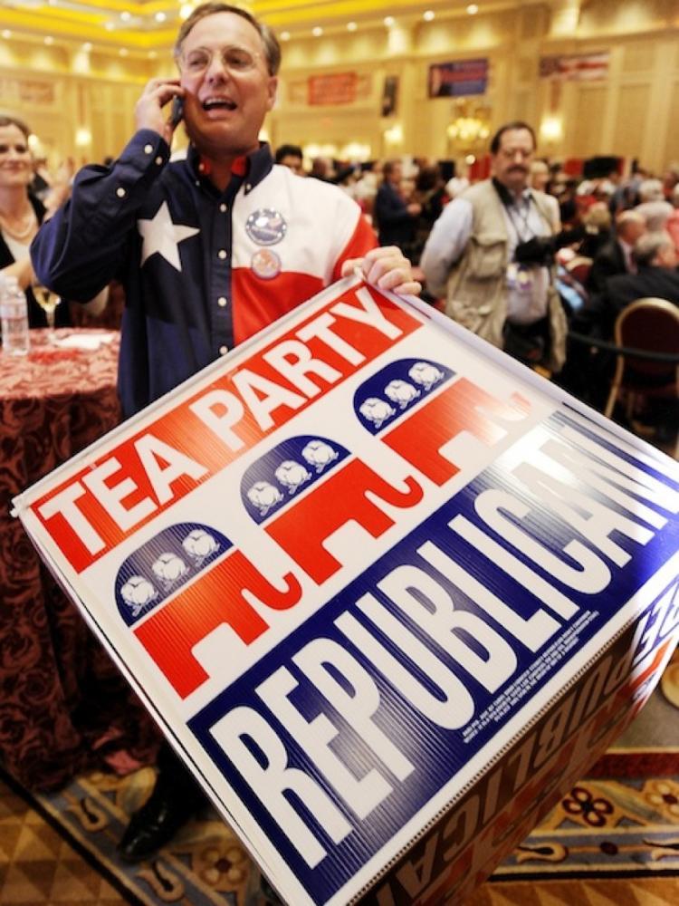 <a><img src="https://www.theepochtimes.com/assets/uploads/2015/09/106475262tea.jpg" alt="TEA PARTY MOVEMENT: A Tea Party supporter holds a sign on Nov. 2, at the Nevada Republican Party's Election Night event in Las Vegas, NV.  (Robyn Beck/AFP/Getty Images)" title="TEA PARTY MOVEMENT: A Tea Party supporter holds a sign on Nov. 2, at the Nevada Republican Party's Election Night event in Las Vegas, NV.  (Robyn Beck/AFP/Getty Images)" width="320" class="size-medium wp-image-1810430"/></a>