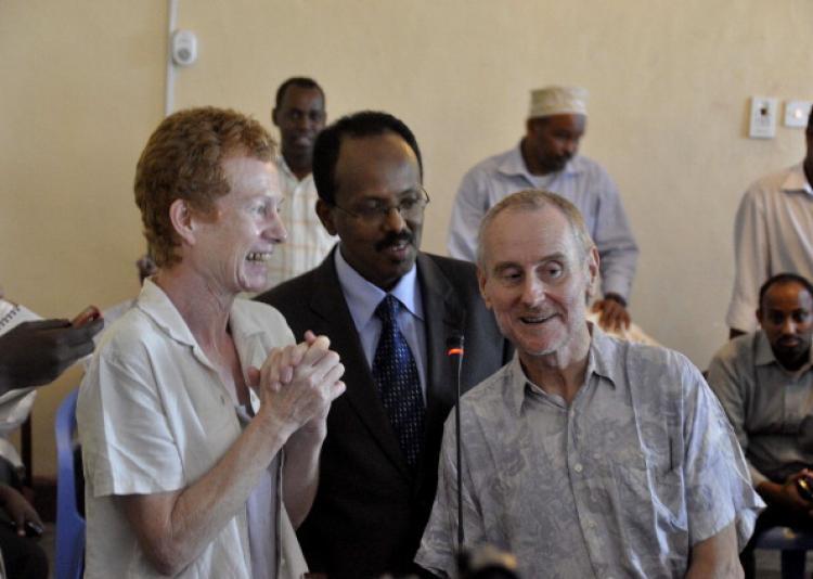 <a><img src="https://www.theepochtimes.com/assets/uploads/2015/09/106822105.jpg" alt="Released British hostages Rachel (L) and Paul (R) Chandler pose with newly-appointed Somali Prime Minister Mohamed Abdullahi Mohamed. (Mustafa Abdi/AFP/Getty Images))" title="Released British hostages Rachel (L) and Paul (R) Chandler pose with newly-appointed Somali Prime Minister Mohamed Abdullahi Mohamed. (Mustafa Abdi/AFP/Getty Images))" width="320" class="size-medium wp-image-1812149"/></a>