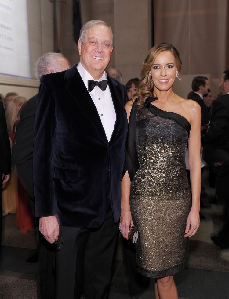 <a><img src="https://www.theepochtimes.com/assets/uploads/2015/09/106975945DavidKoch.jpg" alt="David Koch and his wife Julie Koch attend the American Museum of Natural History's 2010 Museum Gala on Nov. 18, 2010, in New York City. A new video circulating on the Web is accusing the Koch brothers of spending tens of millions of dollars funding a deliberate propaganda effort to win Social Security changes. (Michael Loccisano/Getty Images)" title="David Koch and his wife Julie Koch attend the American Museum of Natural History's 2010 Museum Gala on Nov. 18, 2010, in New York City. A new video circulating on the Web is accusing the Koch brothers of spending tens of millions of dollars funding a deliberate propaganda effort to win Social Security changes. (Michael Loccisano/Getty Images)" width="300" class="size-medium wp-image-1801852"/></a>