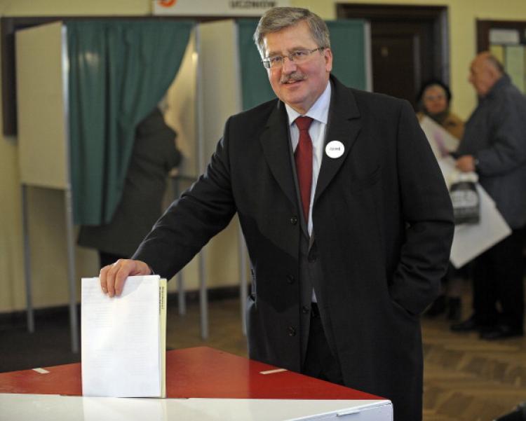 <a><img src="https://www.theepochtimes.com/assets/uploads/2015/09/107044826.jpg" alt="President Bronislaw Komorowski casts his ballot in a polling station in Warsaw on Nov. 21, 2010 during Poland's local elections.  (Janek Skarzynski/AFP/Getty Images)" title="President Bronislaw Komorowski casts his ballot in a polling station in Warsaw on Nov. 21, 2010 during Poland's local elections.  (Janek Skarzynski/AFP/Getty Images)" width="320" class="size-medium wp-image-1811551"/></a>